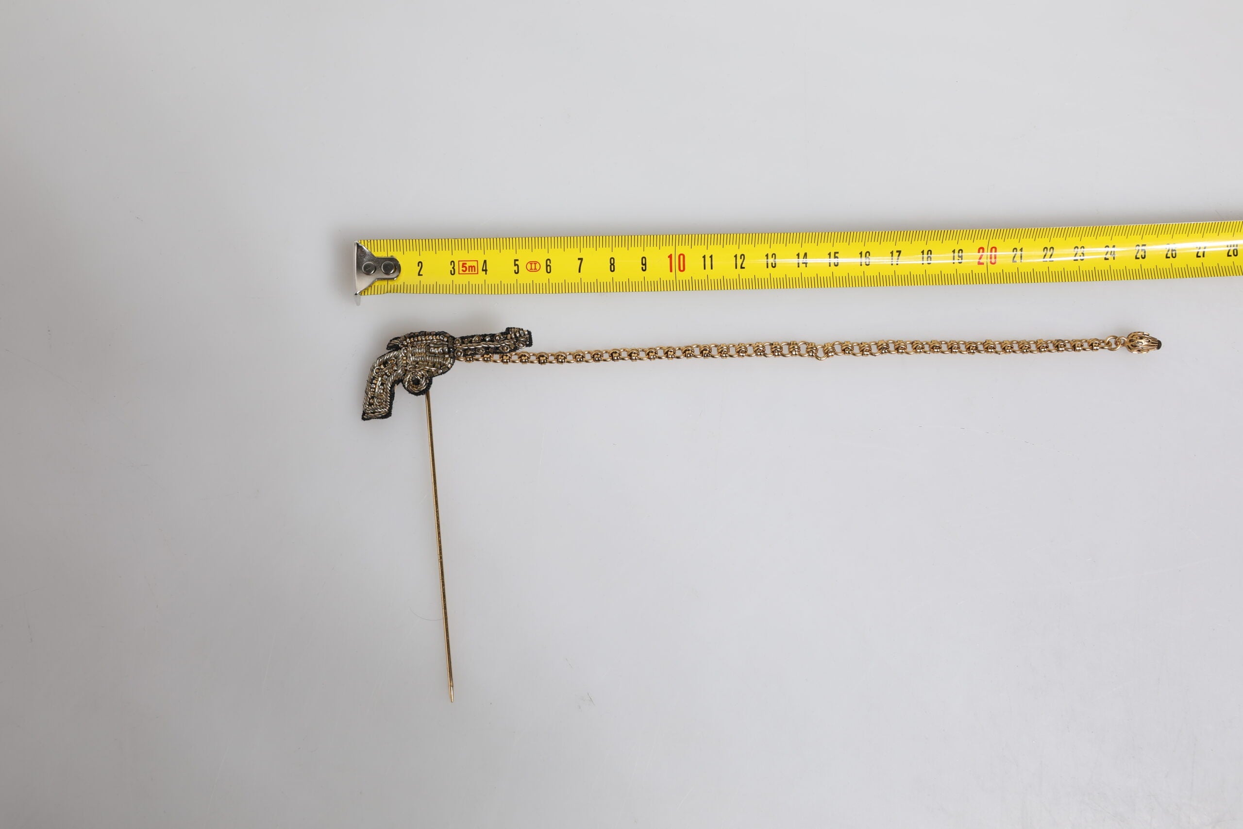 Dolce & Gabbana Black Gold Brass Copper Revolver Brooch Lapel Pin Dolce & Gabbana